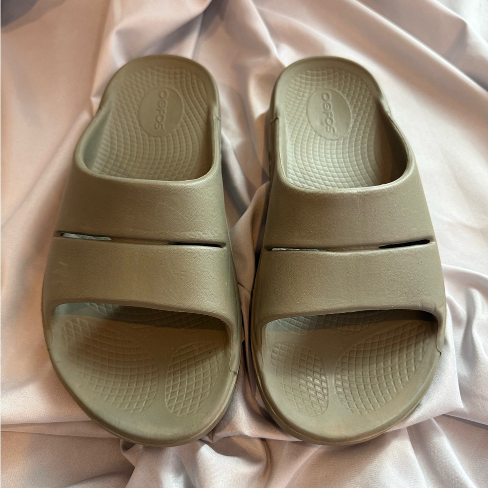 Oofos Slide Sandals in Olive.